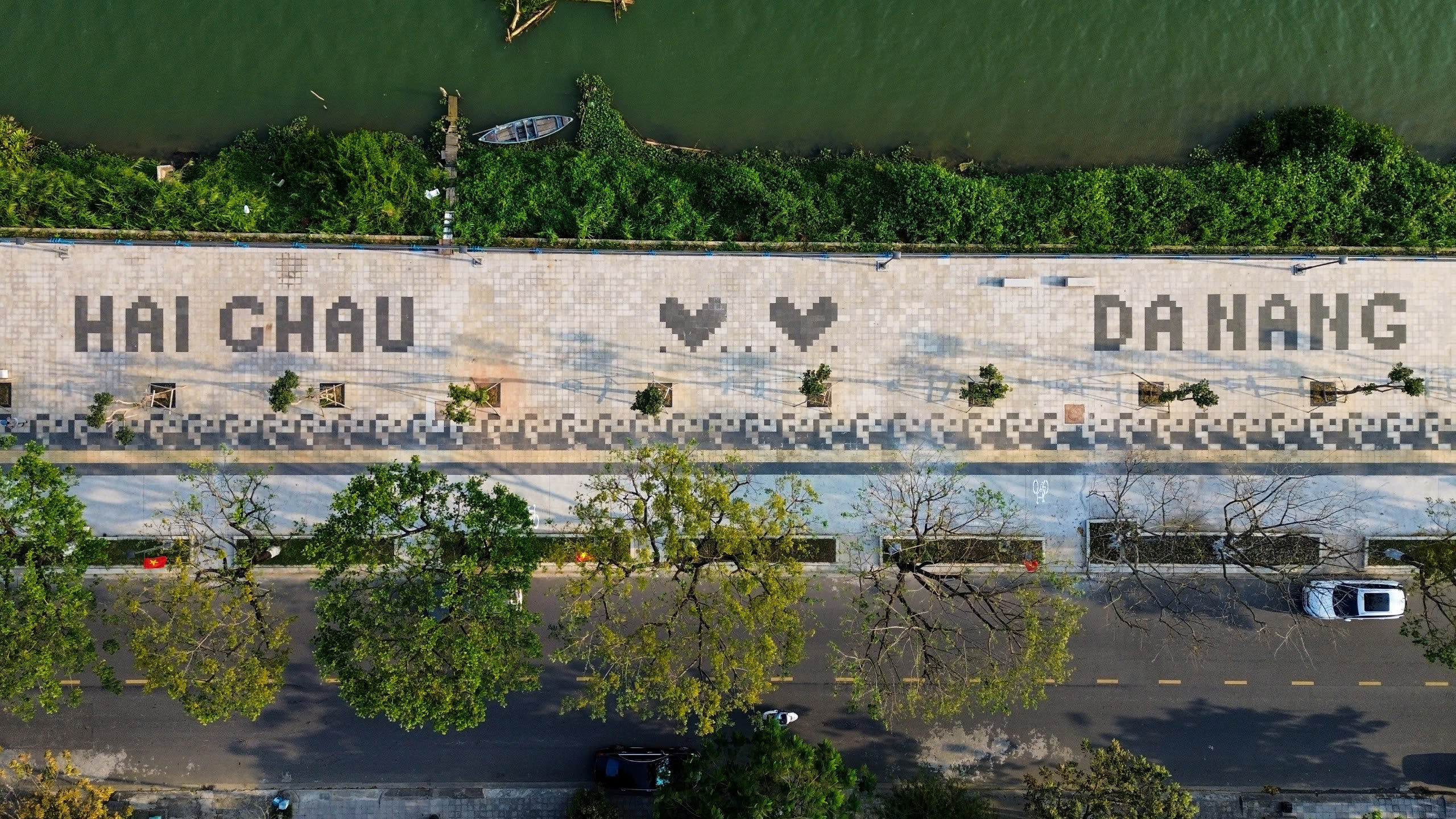 Da Nang realizuje projekt renowacji chodnika wzdłuż rzeki Thang Long Street – zdjęcie 5. Đà Nẵng đưa vào sử dụng công trình cải tạo cảnh quan vỉa hè bờ sông đường Thăng Long - Ảnh 5.